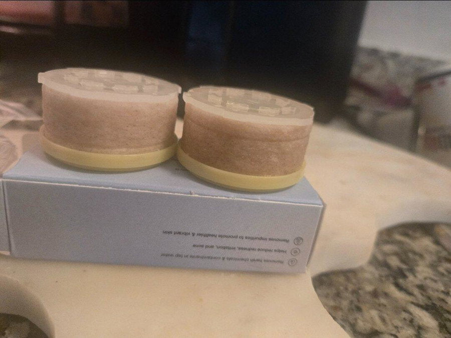 Customer photo: two used cartridges stained tan
